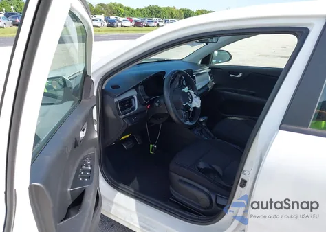 2023 Kia Rio Lx/S z USA, uszkodzony, nr VIN 3KPA24AD9PE521355